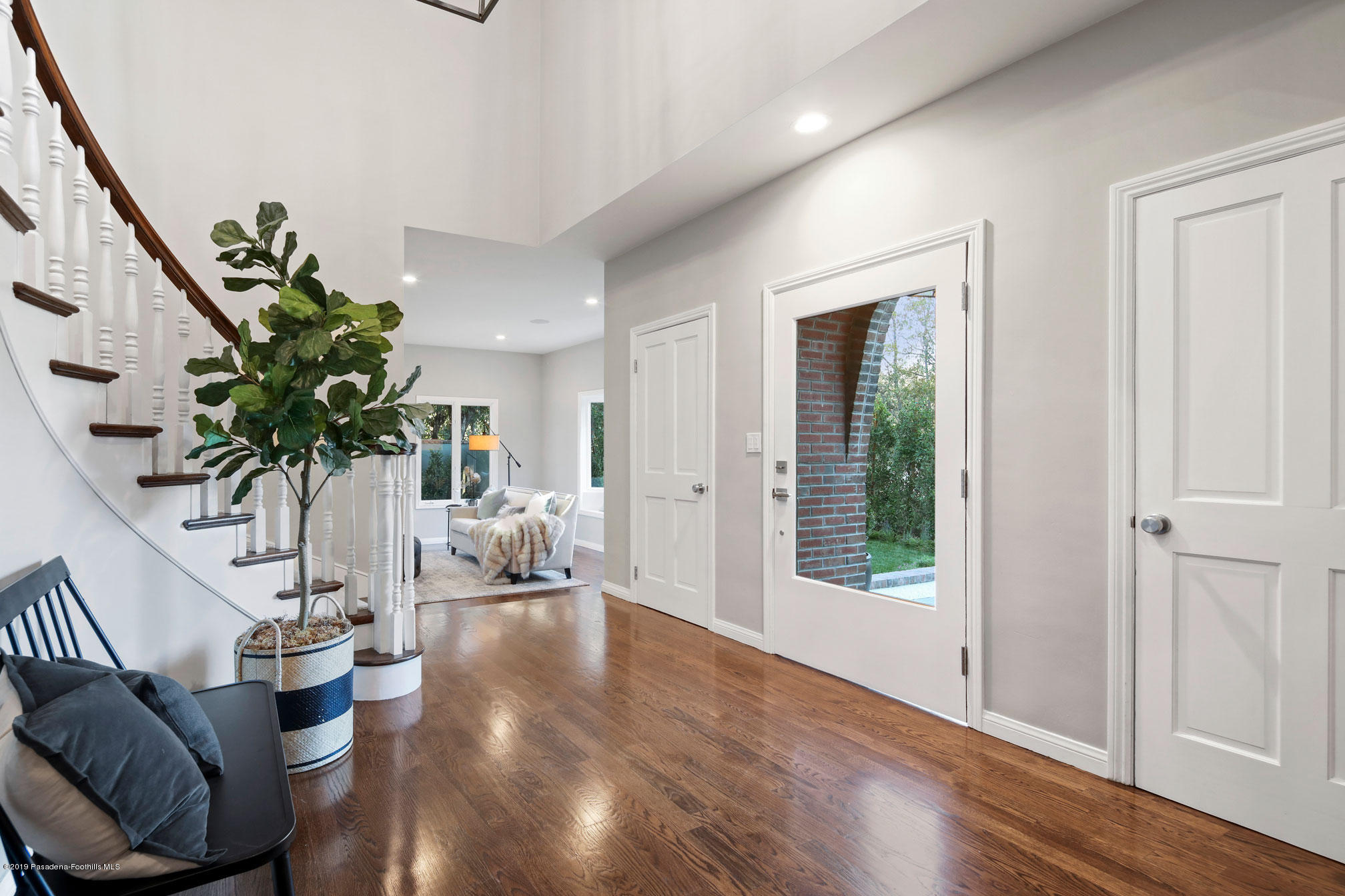 45 Club Road Pasadena, CA 91105 - Photo 5 of 36 a living room with furniture and a potted plant