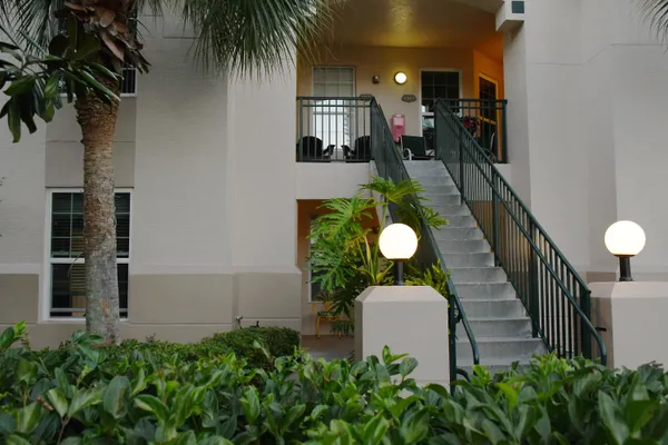 an aerial view of a house swimming pool and patio