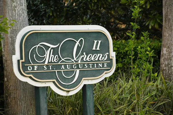 a view of a sign in a yard