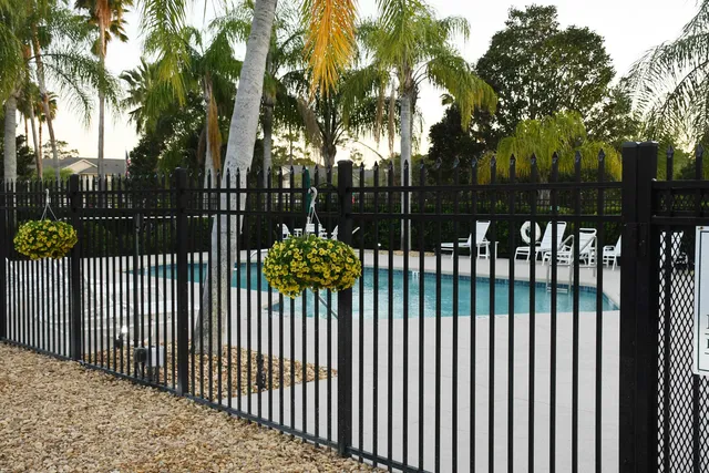 a view of a swimming pool with a patio