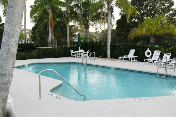 a view of a building with a yard