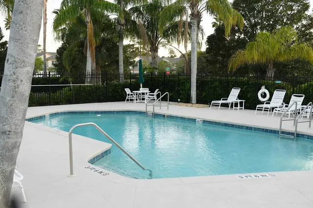 a view of a building with a yard