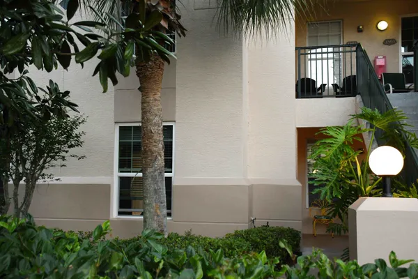 a view of a field with an trees