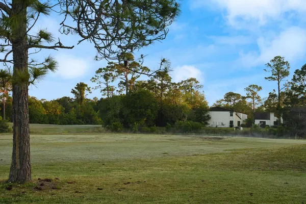 a view of a lake with a big yard