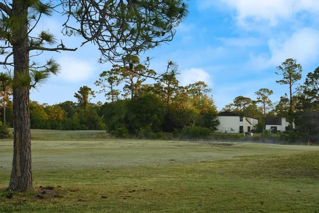 a view of a lake with a big yard