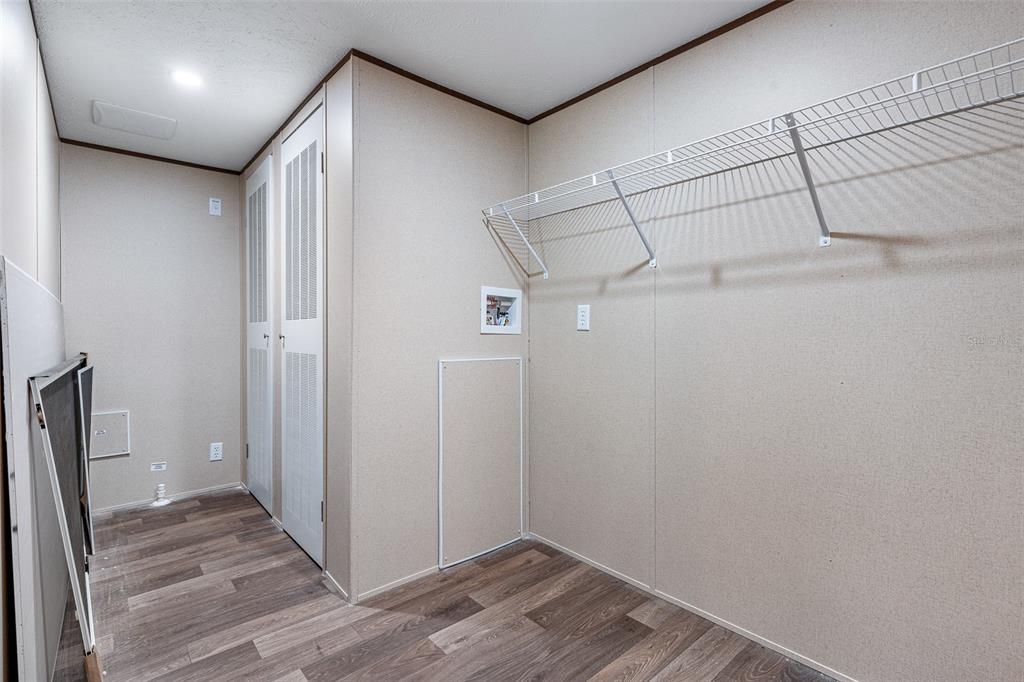 8150 Cherokee Road Bartow, FL 33830 - Photo 35 of 35 a view of a hallway with wooden floor