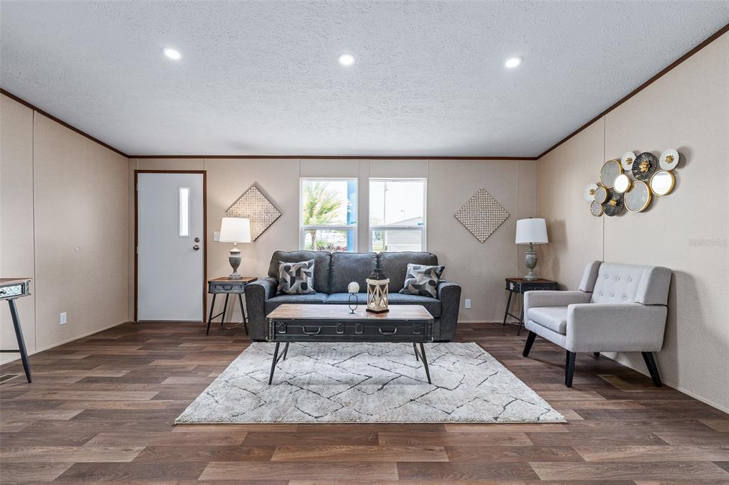 8150 Cherokee Road Bartow, FL 33830 - Photo 4 of 35 a living room with furniture and a rug