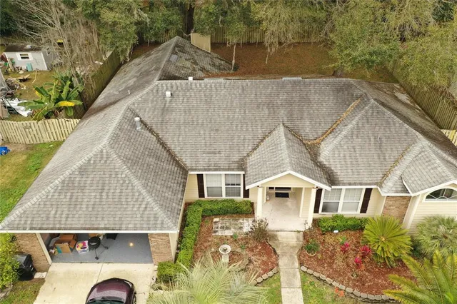 a view of a back yard of the house