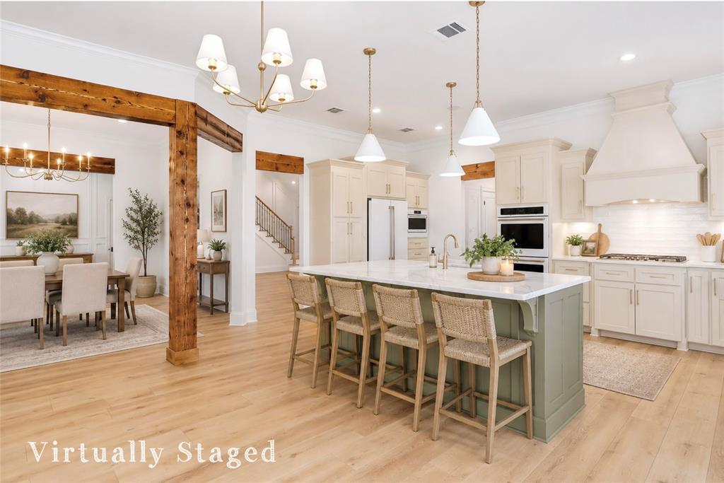 6485 St John's Church Road Hosston, LA 71043 - Photo 6 of 39 a large kitchen with a table and chairs