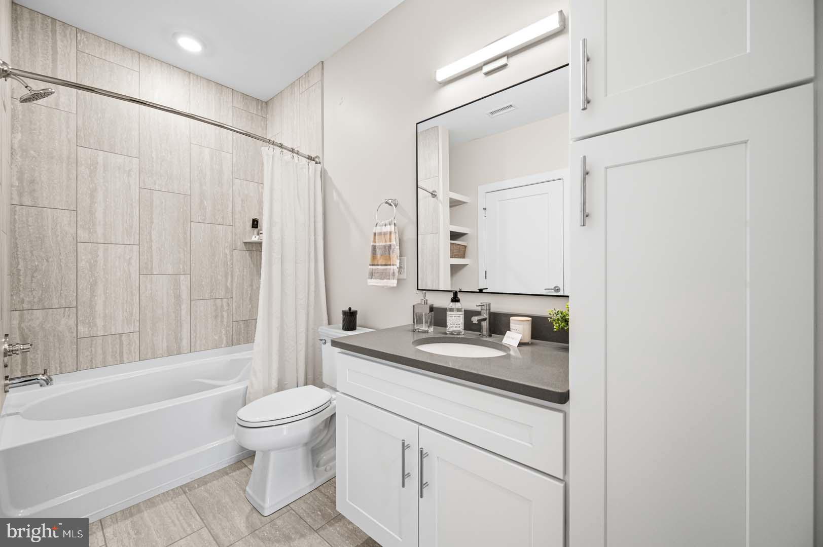 703 Rice Boulevard, Unit 103 Exton, PA 19341 - Photo 8 of 10 Modern bathroom with sleek finishes.