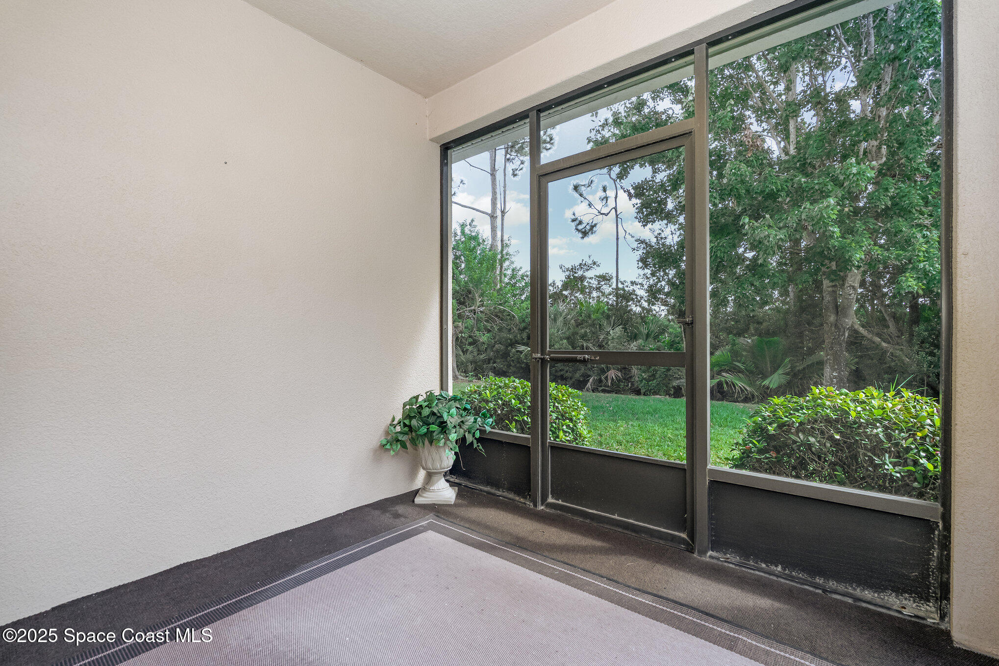 1517 Attilburgh Boulevard Melbourne, FL 32904 - Photo 14 of 15 a room with a large window