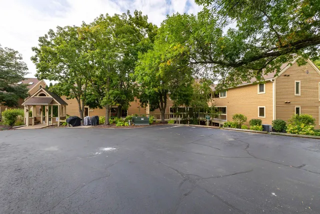 a view of a house with a street