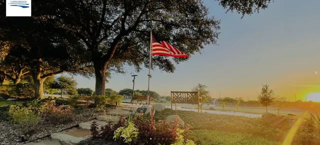 a view of swimming pool with a patio
