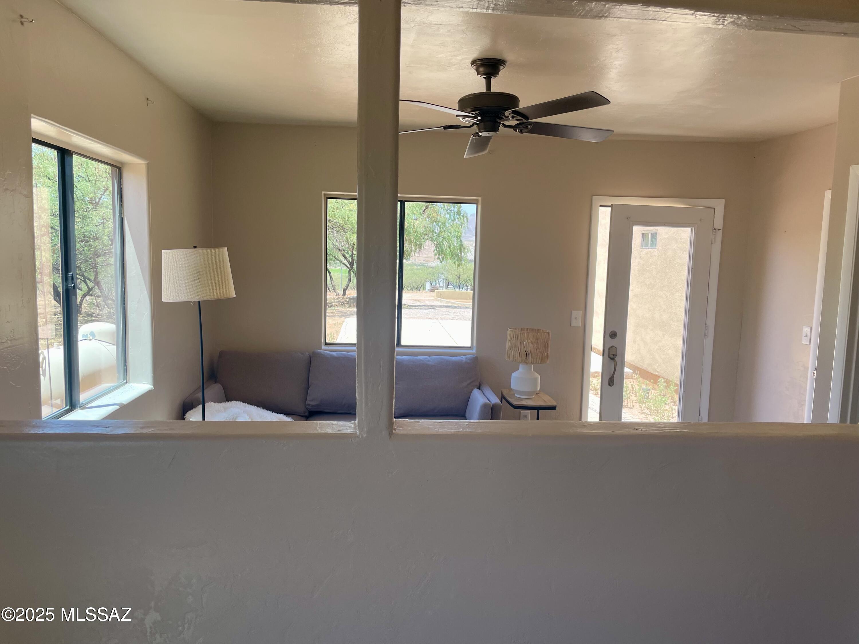 1503 Camino Bacalao Rio Rico, AZ 85648 - Photo 41 of 43 a living room with furniture and a window