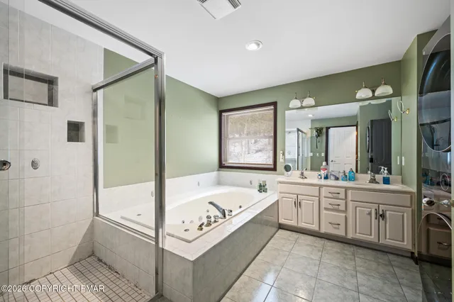 a bathroom with a sink toilet and vanity