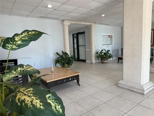 a view of a balcony with two chairs