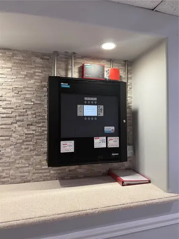 a view of a balcony with two chairs