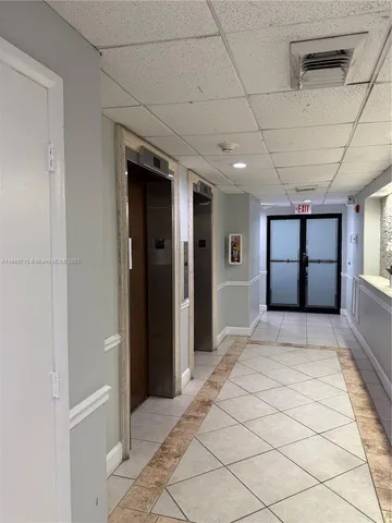a view of a balcony with wooden floor