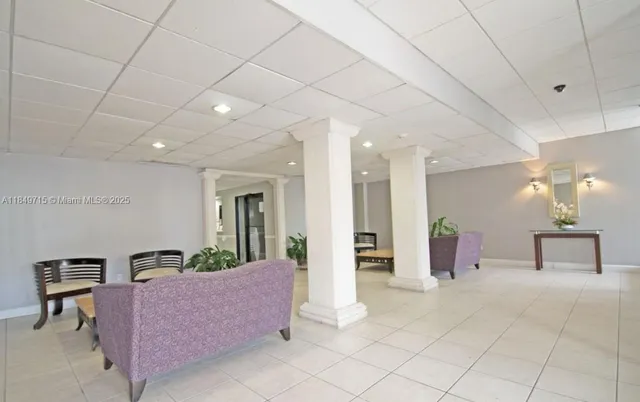 a living room with furniture and a couch