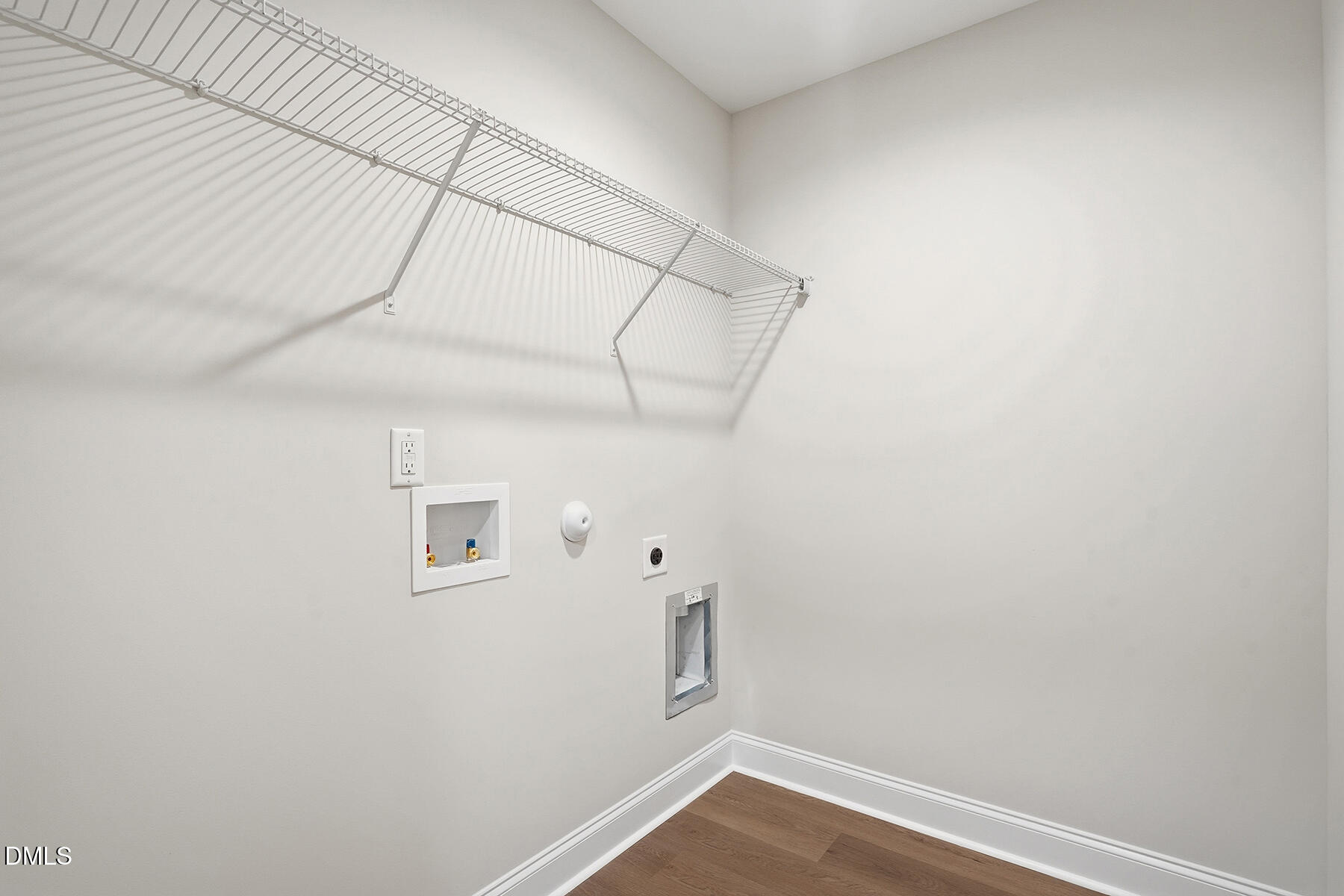 214 Rae Street Warsaw, NC 28398 - Photo 20 of 28 a view of a room with racks on the wall