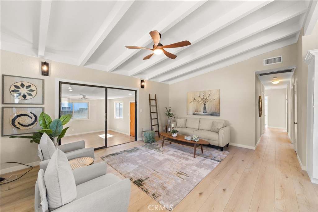 17042 Rorimer Street La Puente, CA 91744 - Photo 3 of 31 Livingroom with the family room beyond.