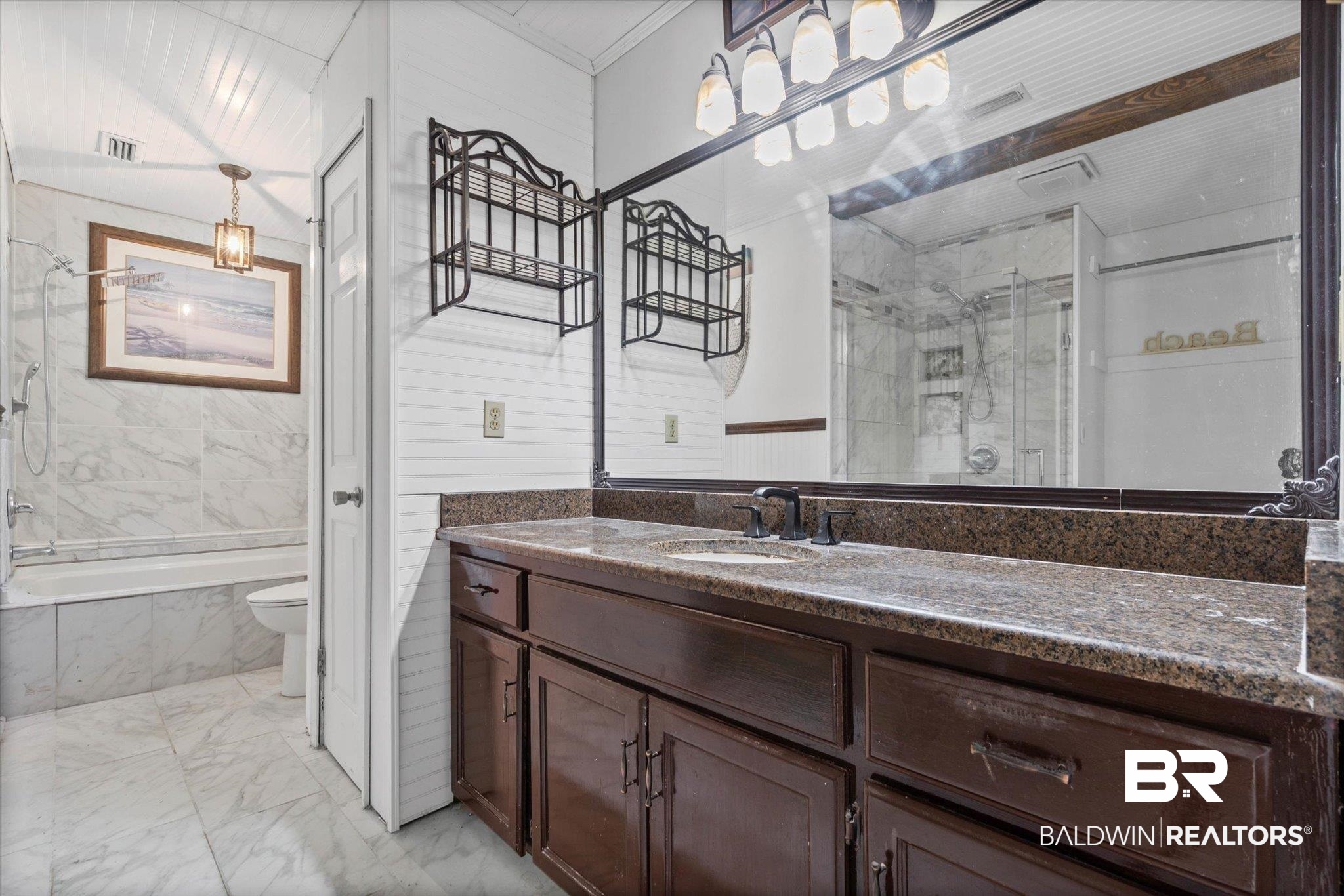 180 Creax Road Axis, AL 36505 - Photo 11 of 35 Full bathroom with vanity, light marble finish floors, and tile walls