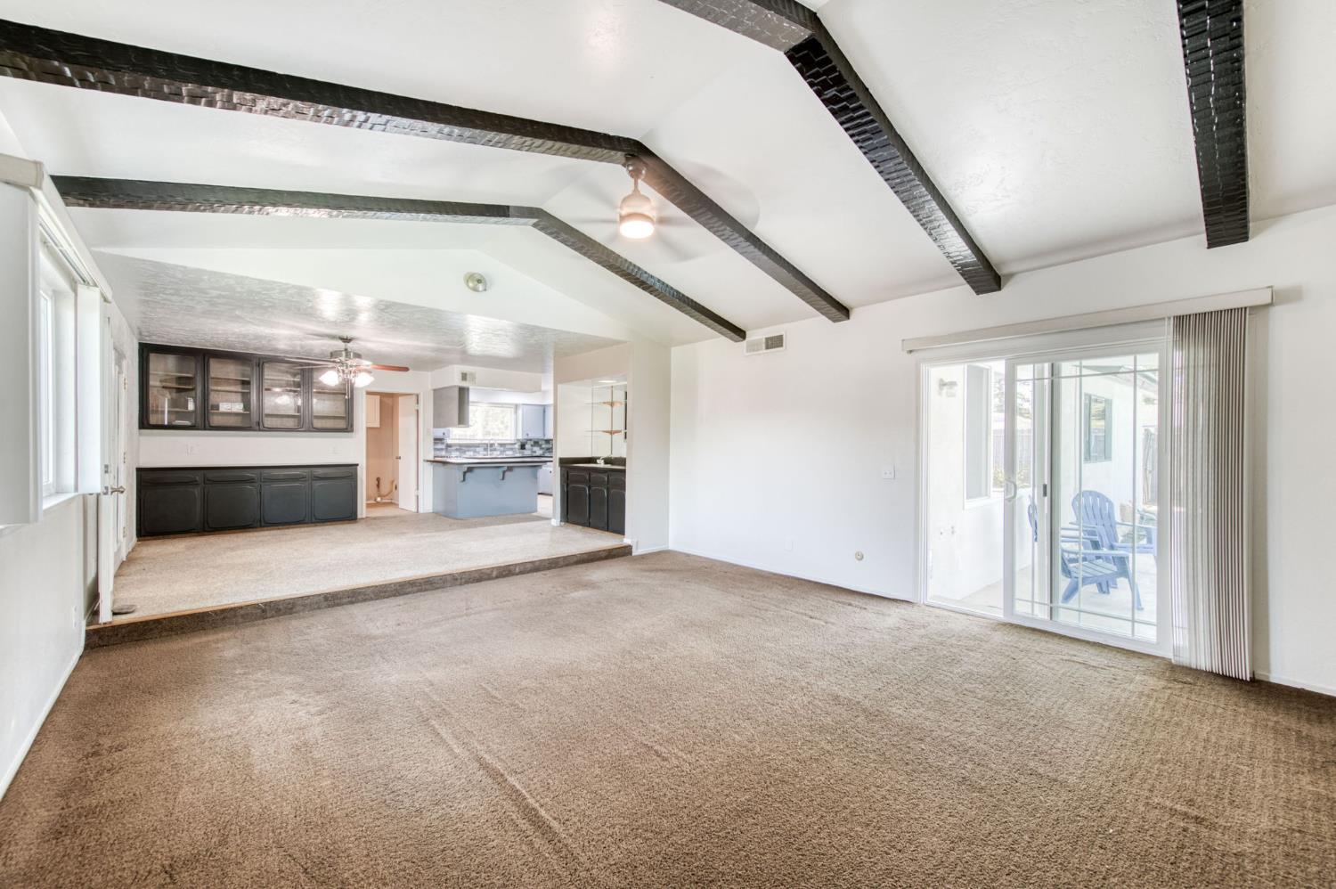 1580 Armstrong Avenue Clovis, CA 93611 - Photo 14 of 50 a view of an empty room with a fireplace