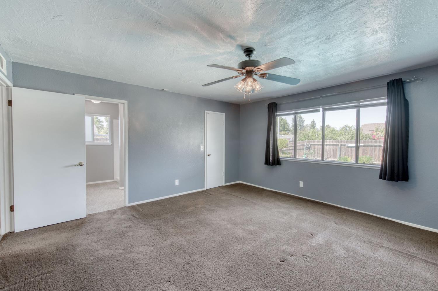 1580 Armstrong Avenue Clovis, CA 93611 - Photo 22 of 50 a view of an empty room with a window