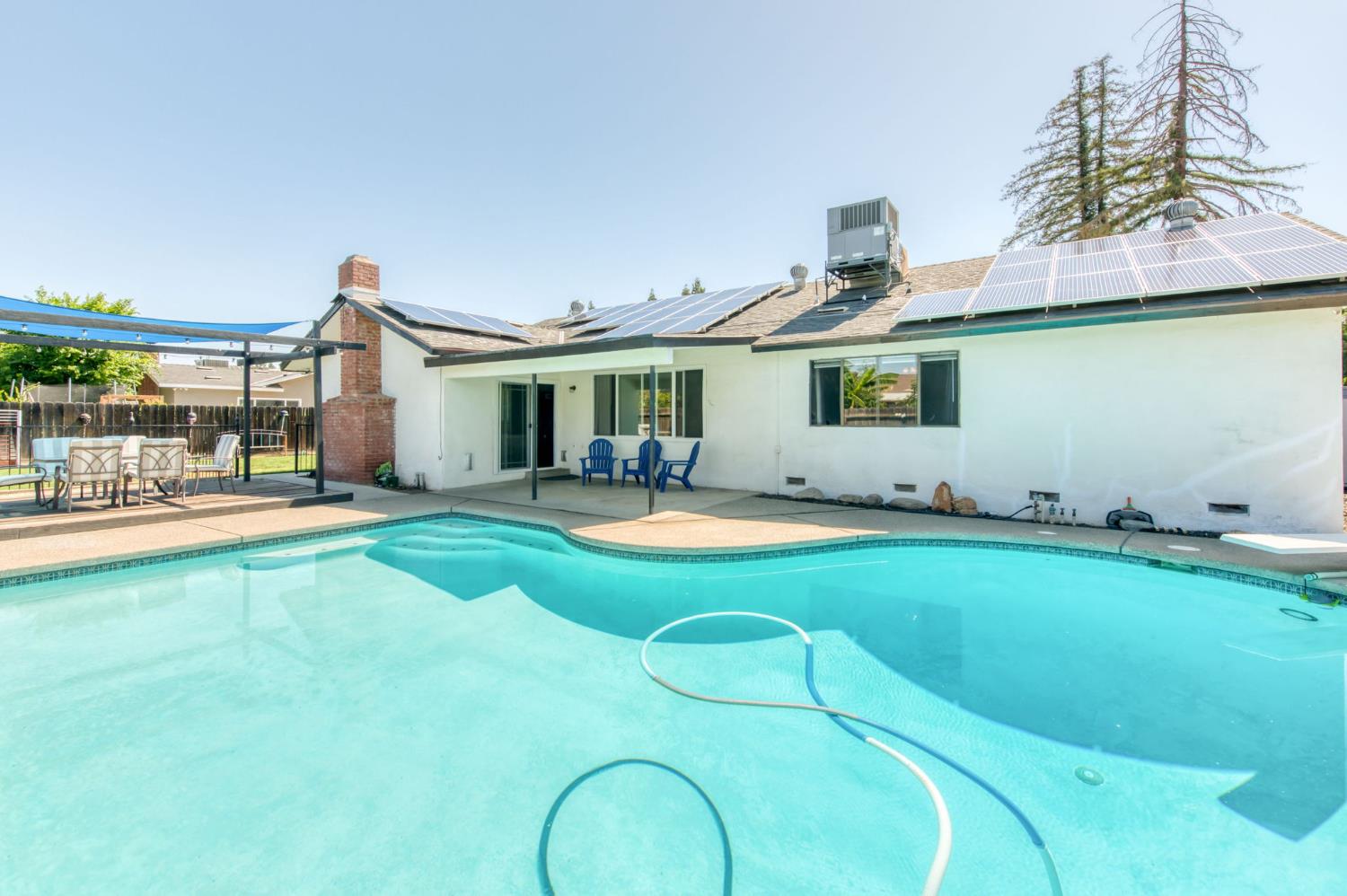 1580 Armstrong Avenue Clovis, CA 93611 - Photo 32 of 50 a view of a house with swimming pool