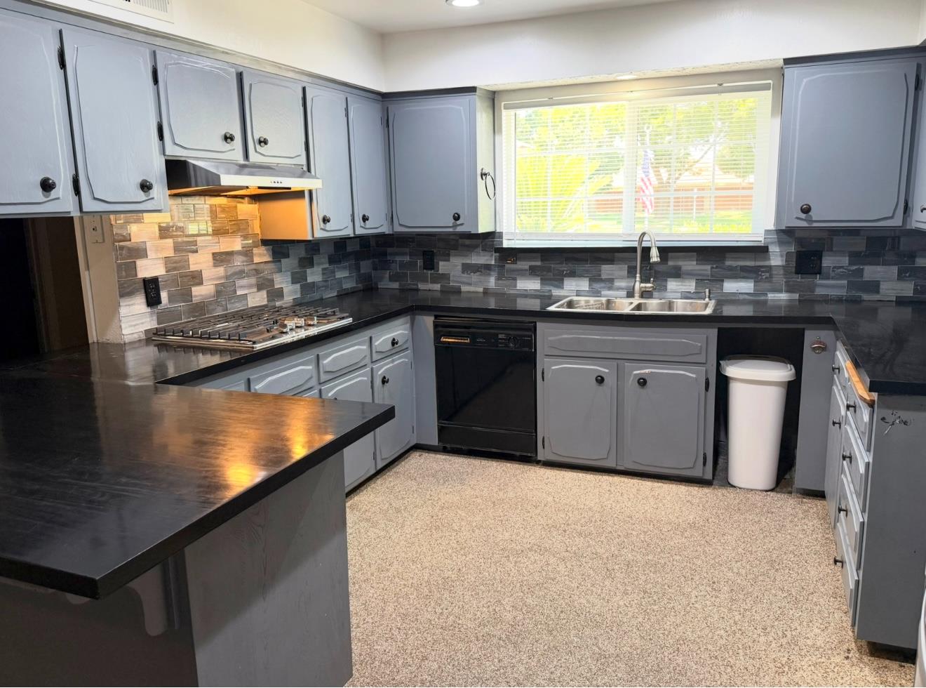 1580 Armstrong Avenue Clovis, CA 93611 - Photo 4 of 50 a kitchen with stainless steel appliances granite countertop a sink stove and refrigerator