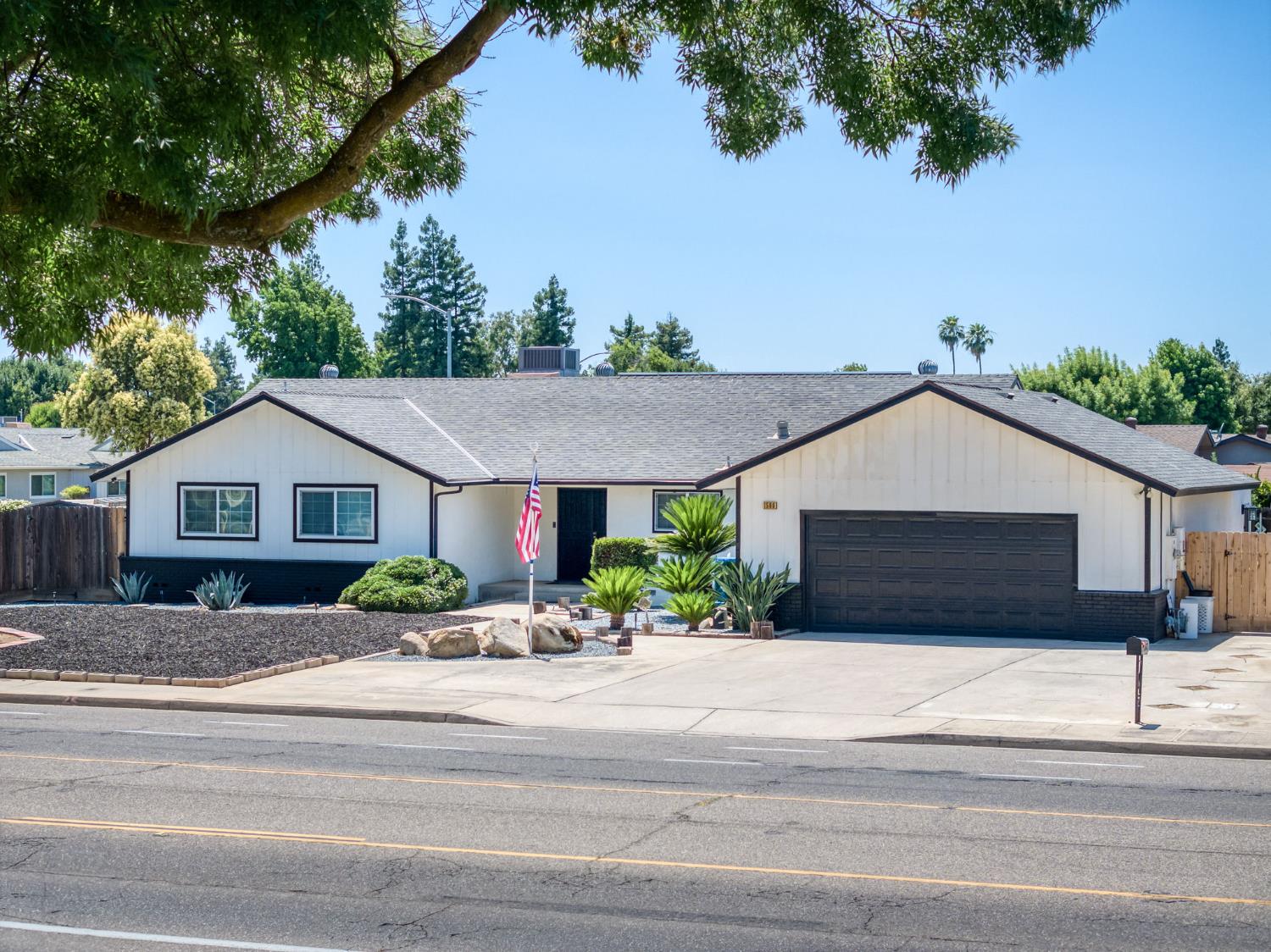 1580 Armstrong Avenue Clovis, CA 93611 - Photo 41 of 50 a front view of a house with a yard