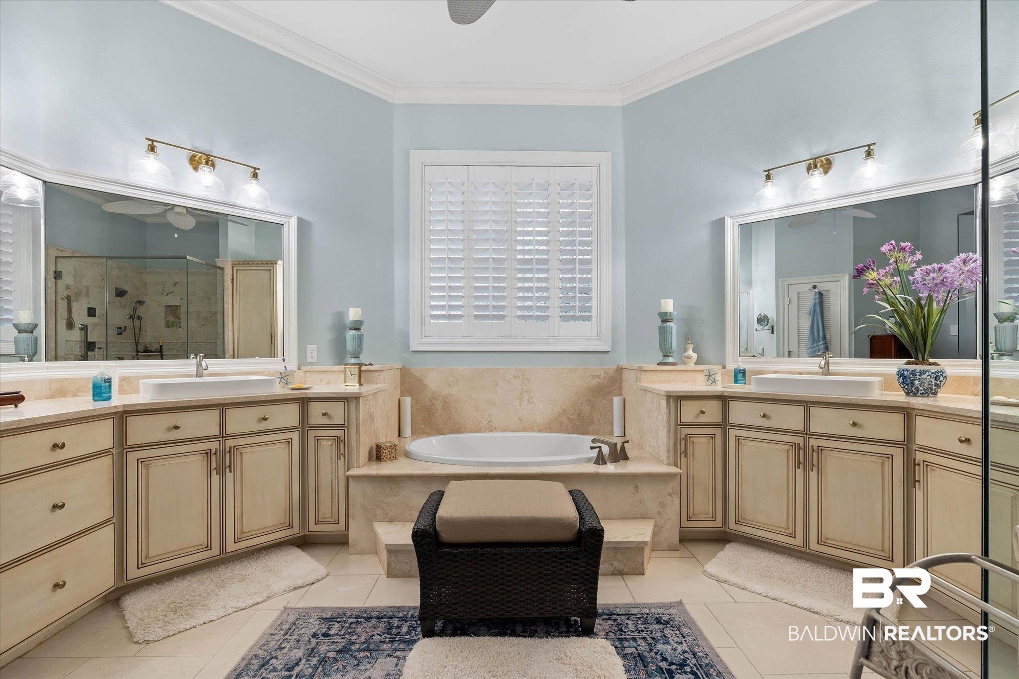 136 Old Mill Road Fairhope, AL 36532 - Photo 17 of 36 Bathroom featuring a central soaking tub and dual vanities with integrated sinks