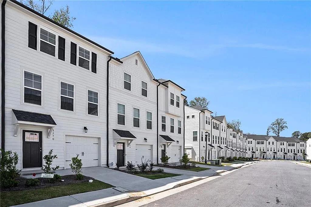 3132 Washburn Street Southeast Atlanta, GA 30354 - Photo 2 of 10 a large building with a street