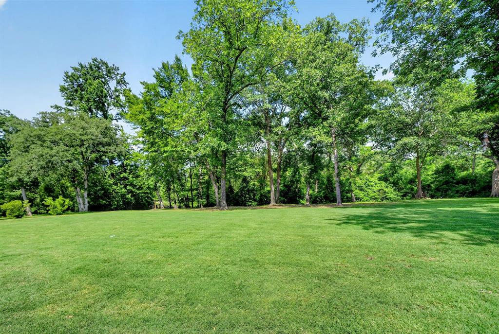 1901 Rose Pointe Athens, TX 75752 - Photo 32 of 37 Expansive green lawn surrounded by mature trees