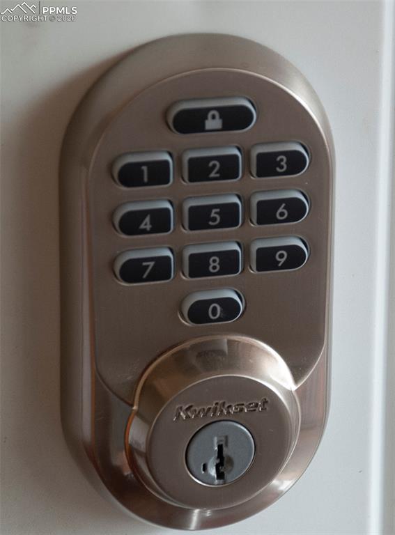 905 Alexander Road Colorado Springs, CO 80909 - Photo 43 of 46 smart lock on back door