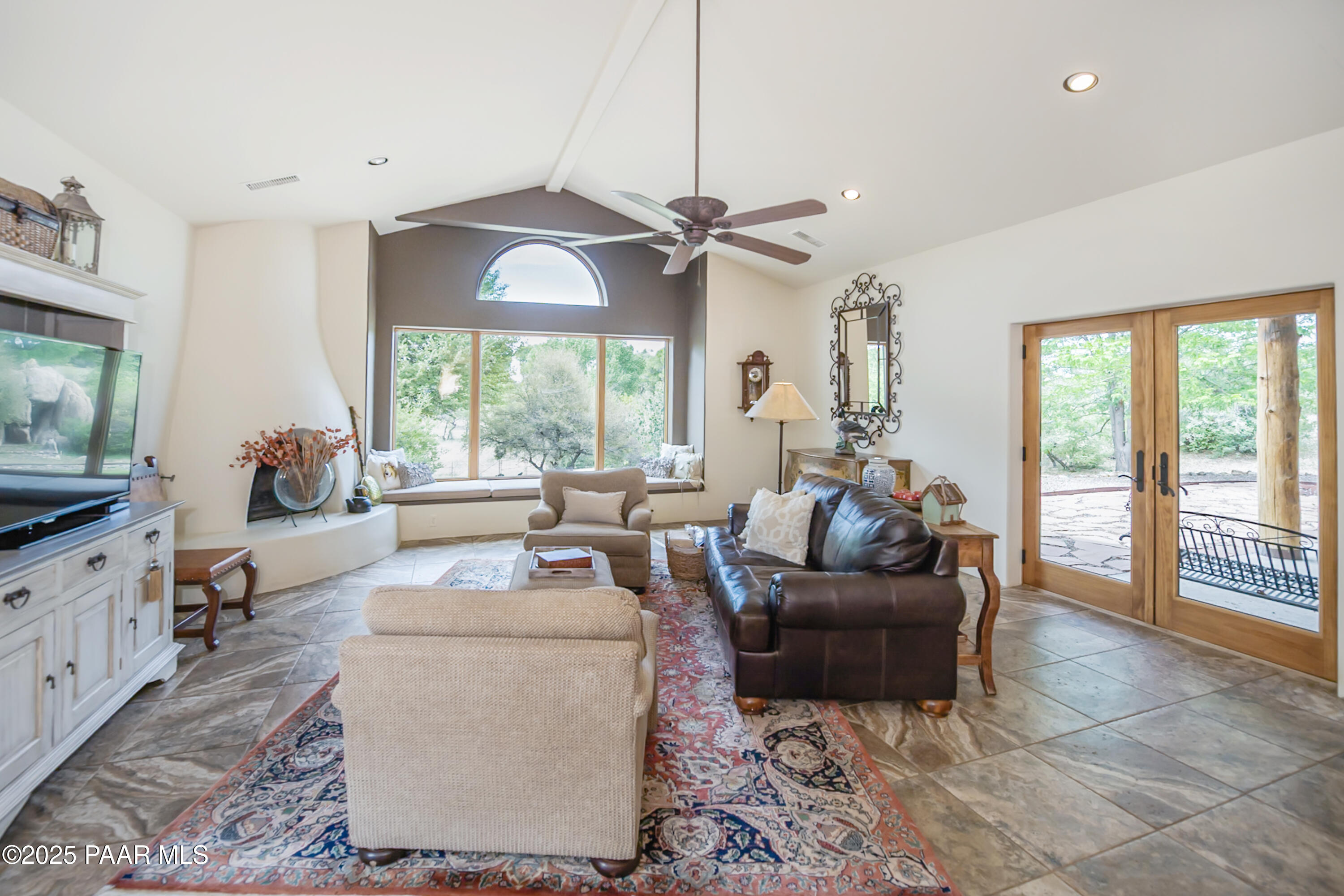 770 Grisby Road Skull Valley, AZ 86338 - Photo 16 of 58 a living room with furniture and a large window