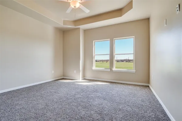 an empty room with a empty space and a window