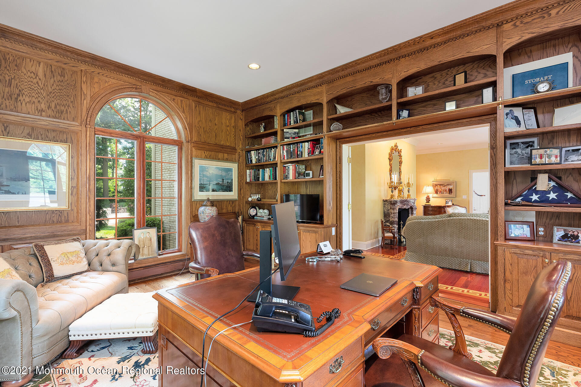 16 A Buttonwood Lane Rumson, NJ 07760 - Photo 14 of 80 a living room with furniture a bookshelf and a large window