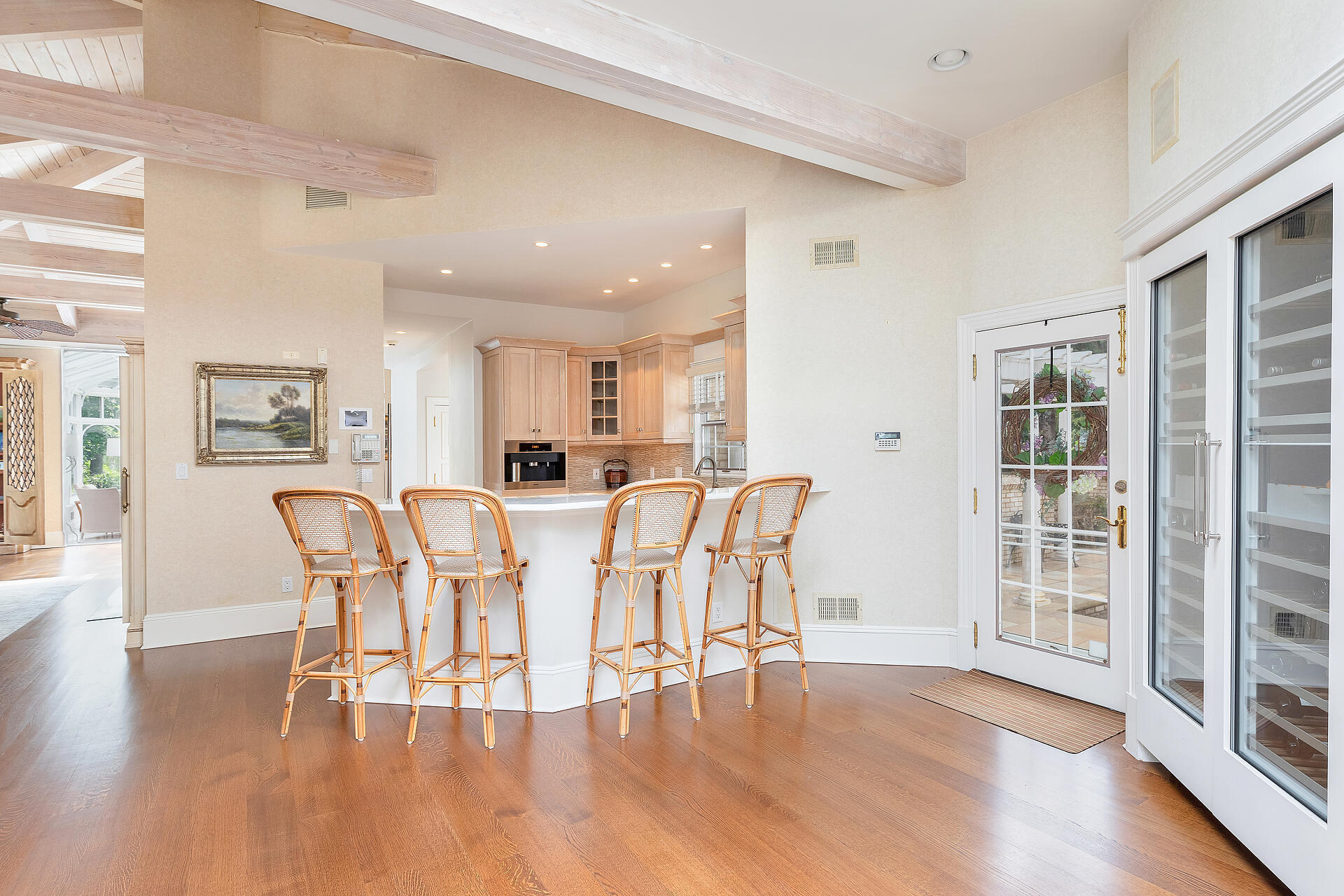 16 A Buttonwood Lane Rumson, NJ 07760 - Photo 22 of 80 a dining room with wooden floor a glass table and chairs