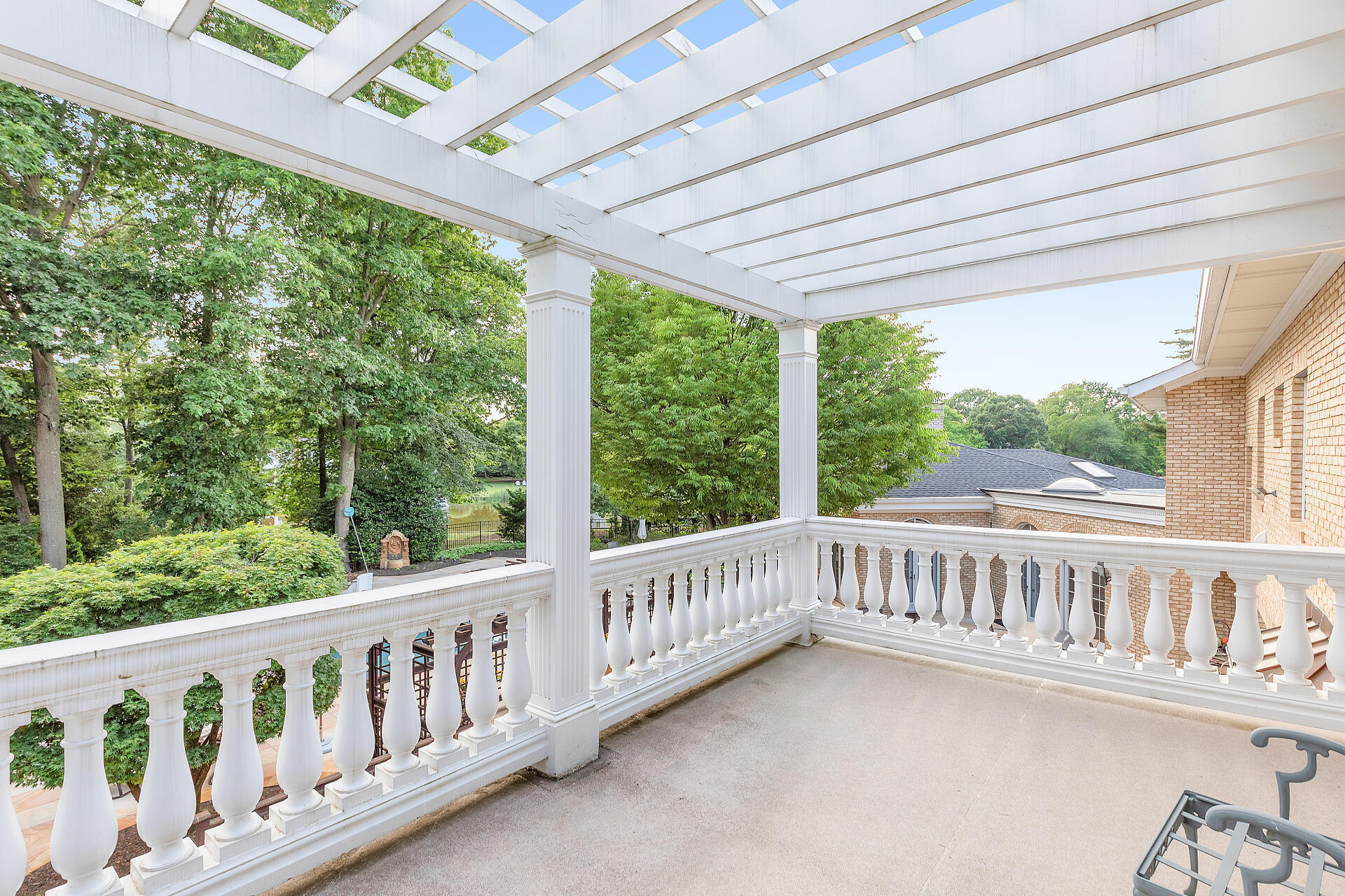 16 A Buttonwood Lane Rumson, NJ 07760 - Photo 44 of 80 a view of a wooden deck and a yard