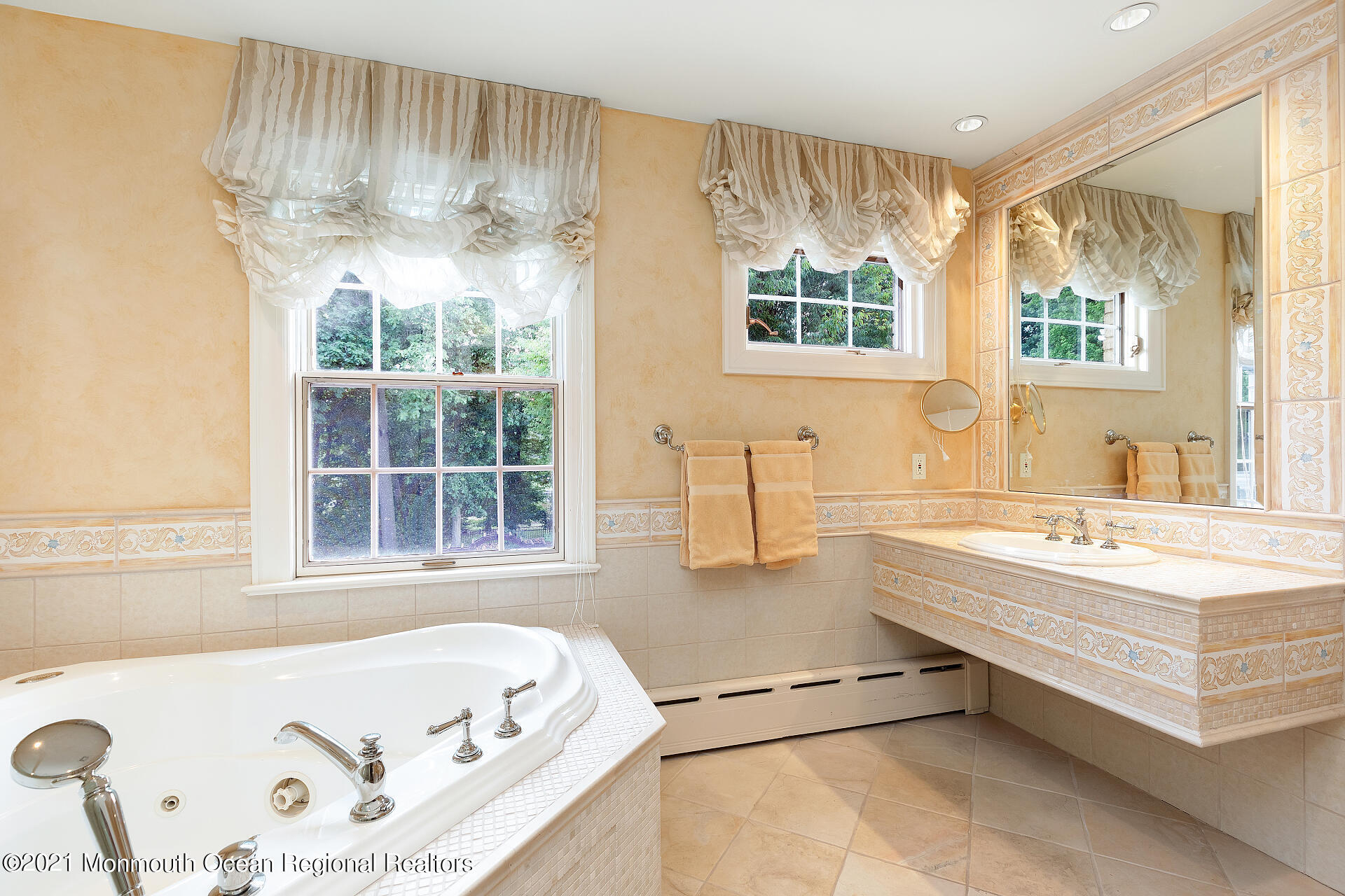16 A Buttonwood Lane Rumson, NJ 07760 - Photo 45 of 80 a bathroom with a tub sink and a window