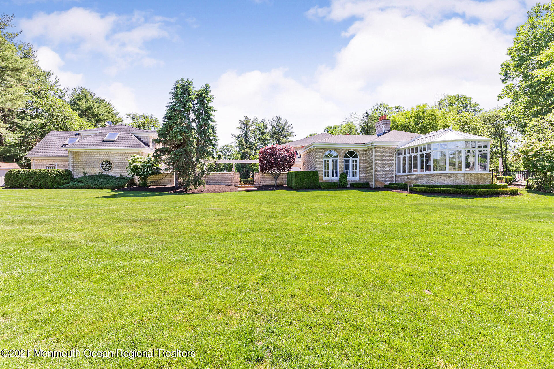 16 A Buttonwood Lane Rumson, NJ 07760 - Photo 64 of 80 a view of a house with a yard and sitting area