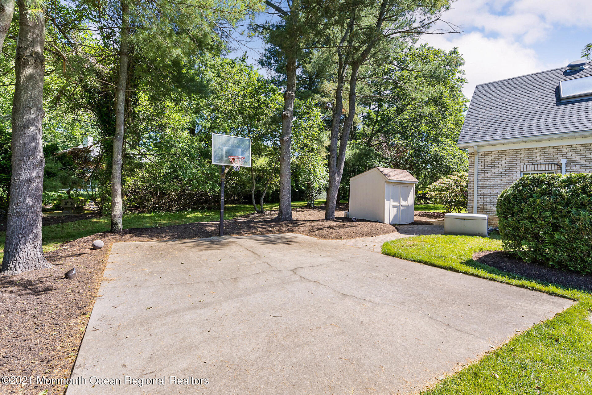 16 A Buttonwood Lane Rumson, NJ 07760 - Photo 68 of 80 a front view of a house with a yard and trees