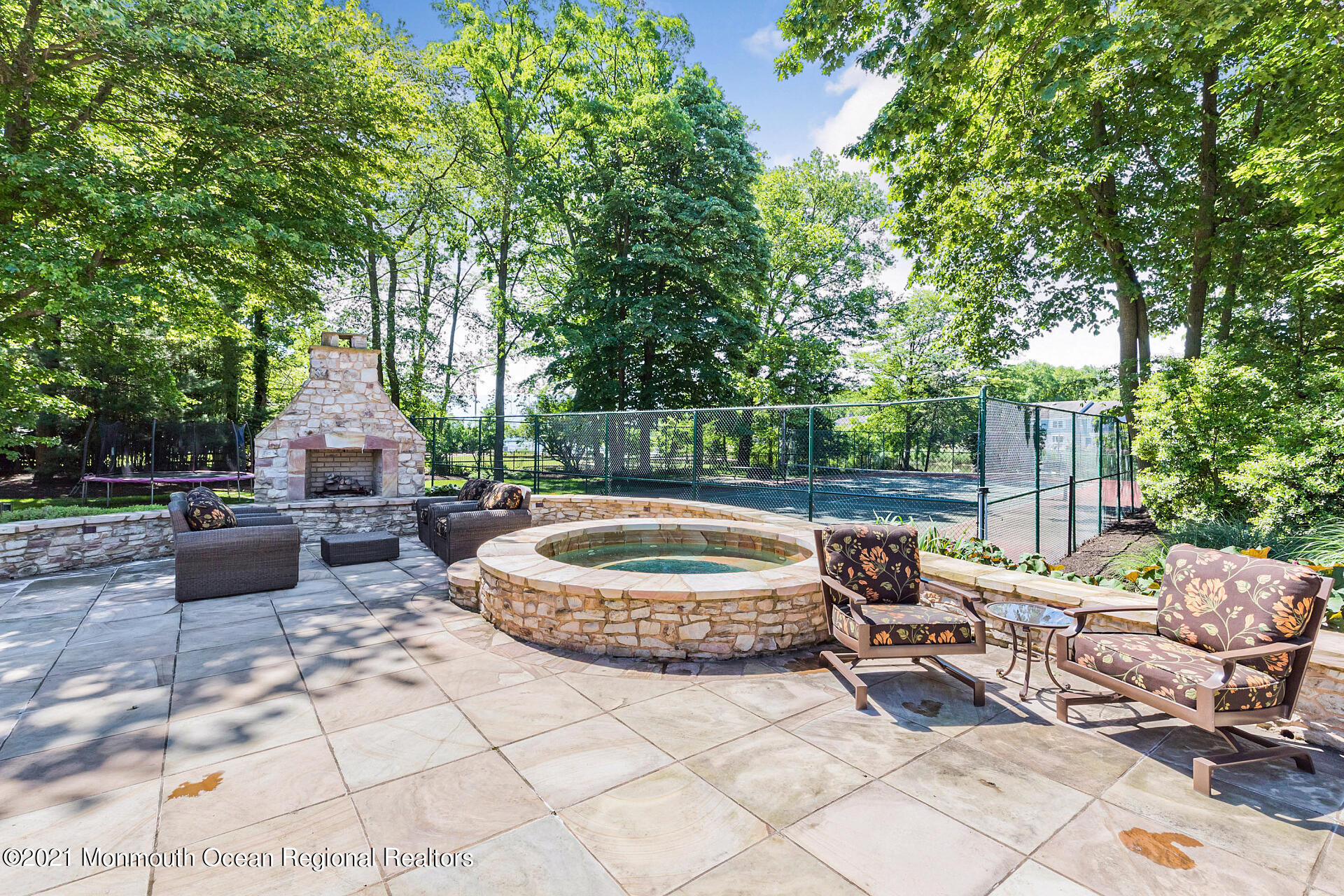 16 A Buttonwood Lane Rumson, NJ 07760 - Photo 70 of 80 a view of backyard with outdoor seating a patio and plants