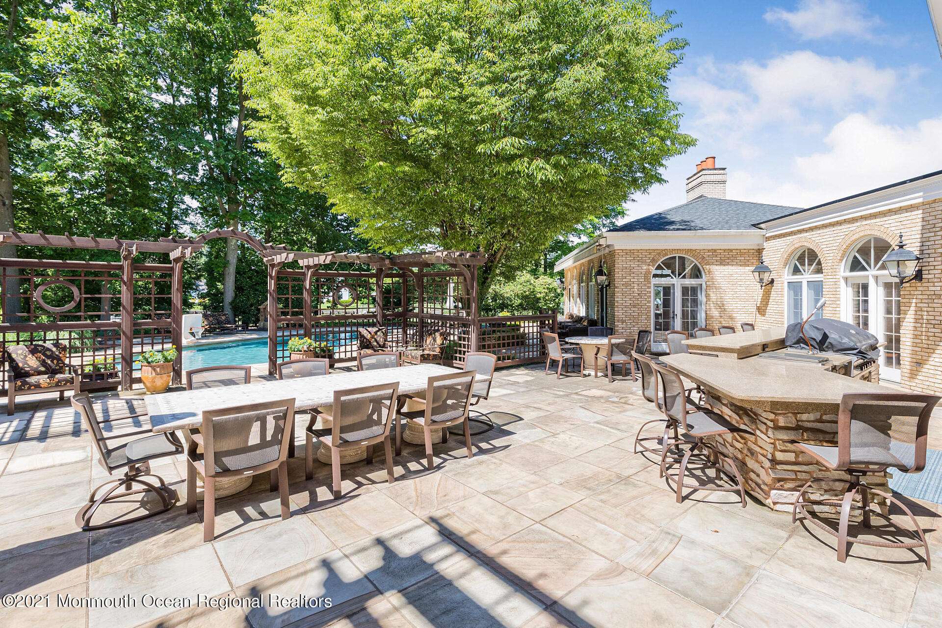 16 A Buttonwood Lane Rumson, NJ 07760 - Photo 74 of 80 a view of a patio with chairs and tables