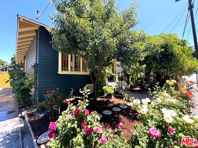 a view of a living room and kitchen view
