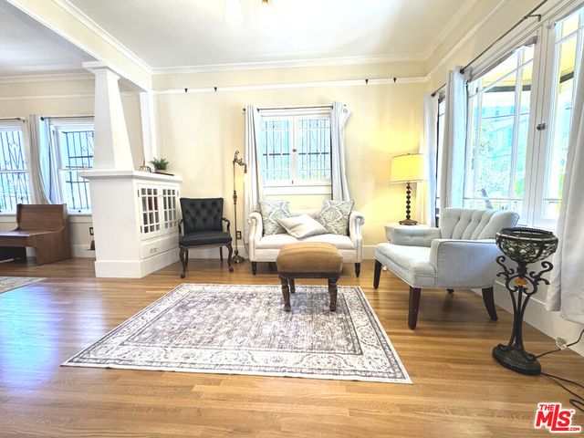 a view of bathroom with a tub and mirror
