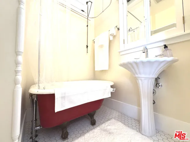 a view of a dining room with furniture and window