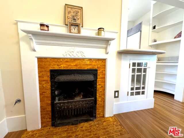 a bathroom with a sink toilet a mirror and bathtub