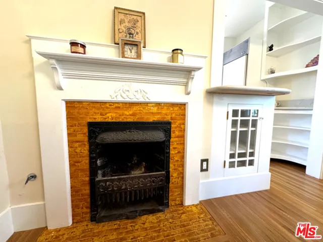 a bathroom with a sink toilet a mirror and bathtub